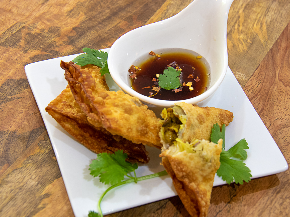 chicken curry samosas with dipping sauce