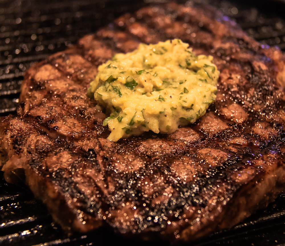 herb steak butter on steak