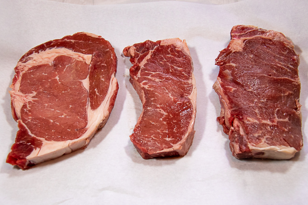 Rib eye steak, strip steak, top sirloin steak