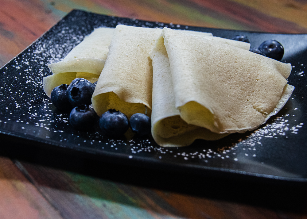 Basic Crepes on a plate with blueberries