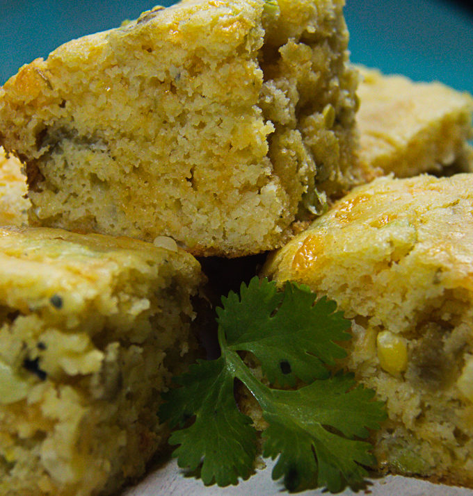 Hatch chile cornbread squares on plate