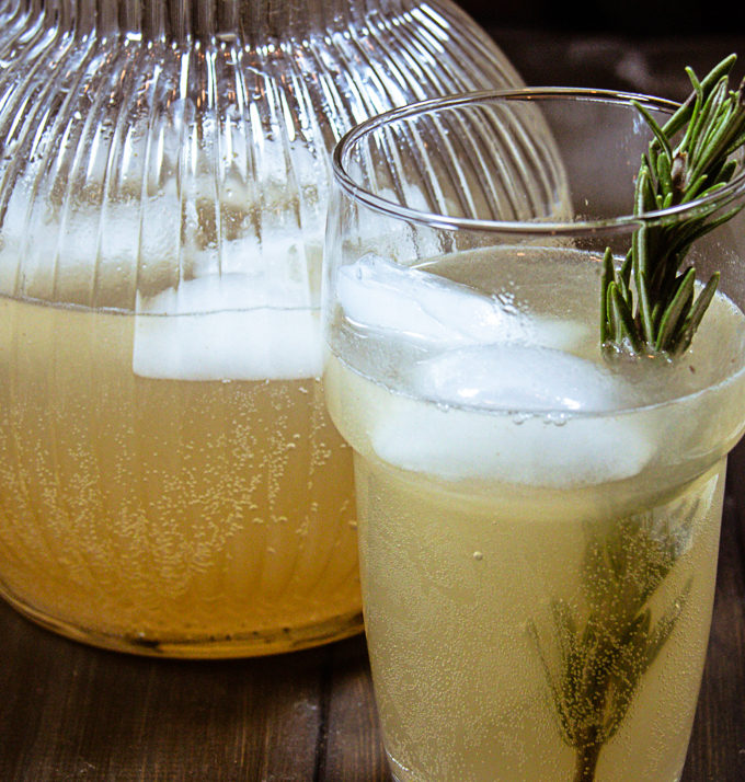 pear rosemary sparkler in a glass