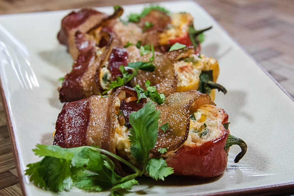 Bacon wrapped pepper poppers on tray