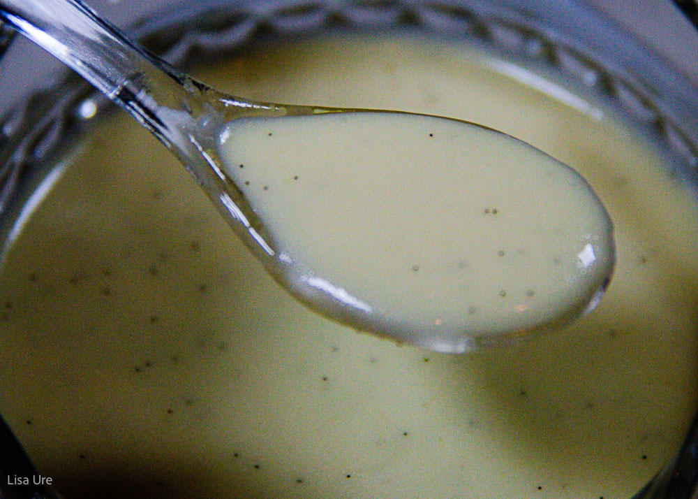 spoonful with drip of creme anglaise