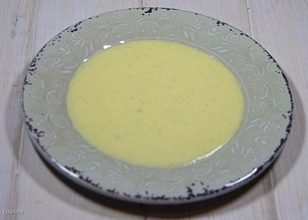 creme anglaise puddled on a dessert plate