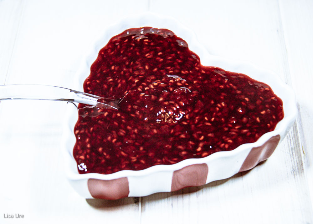 easy raspberry sauce in heart shaped dish