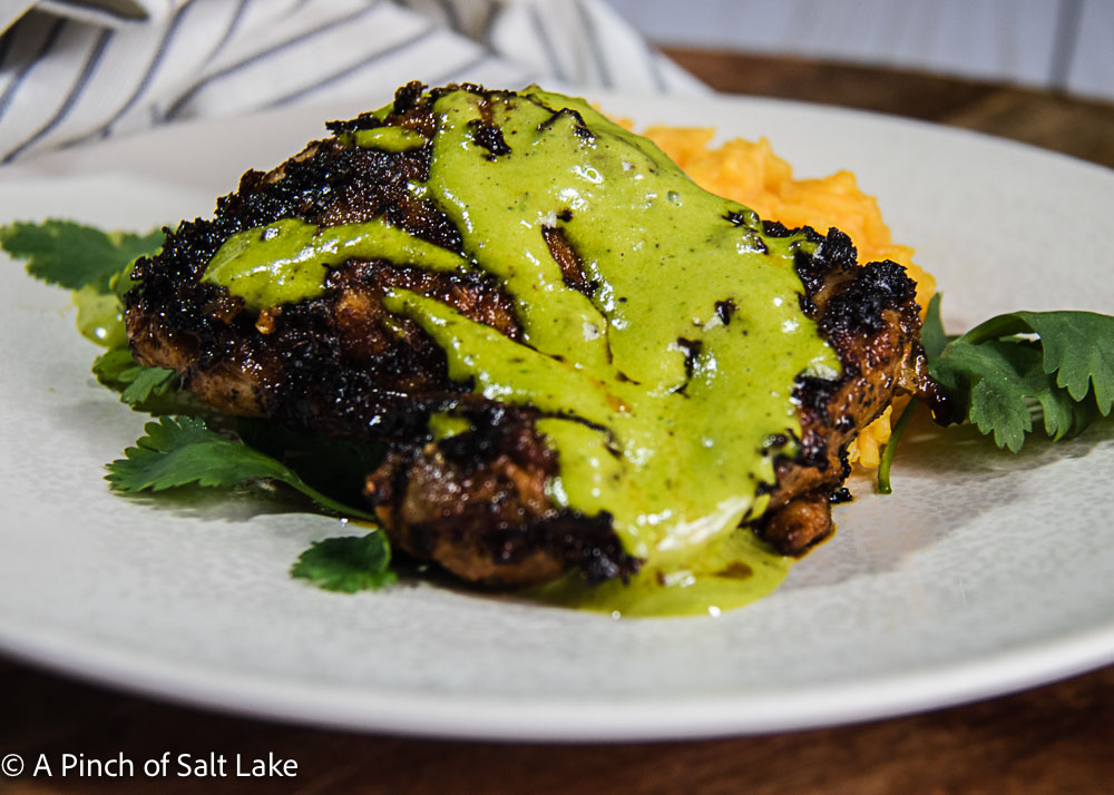 Peruvian Chicken with green sauce on a plate