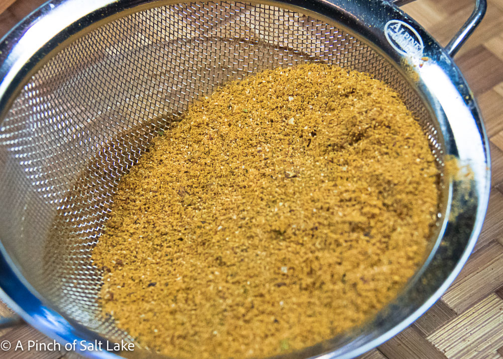 DIY Sazon Spice Mix in a strainer