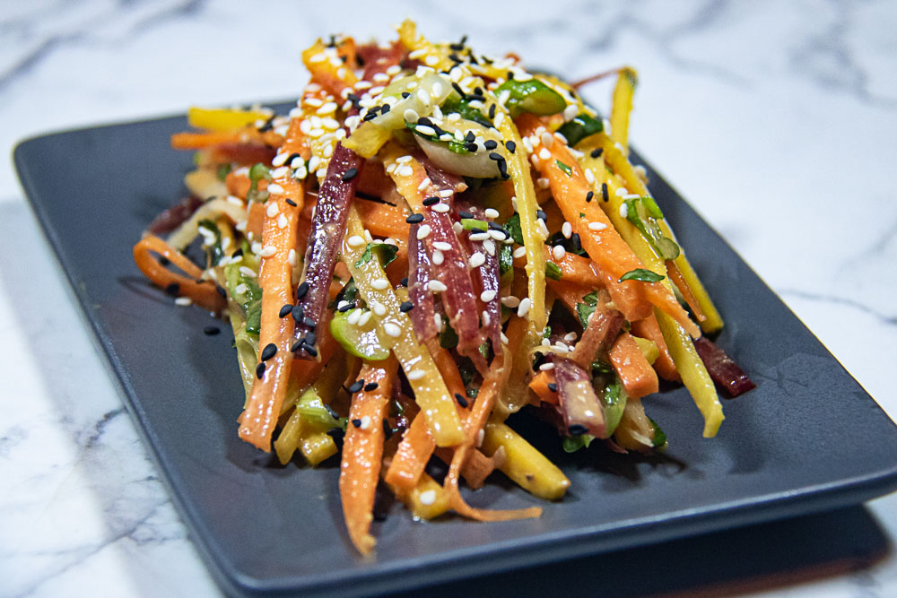 sesame carrot salad on serving platter