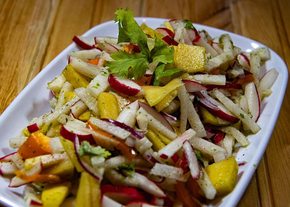 mango jicama salad on serving dish