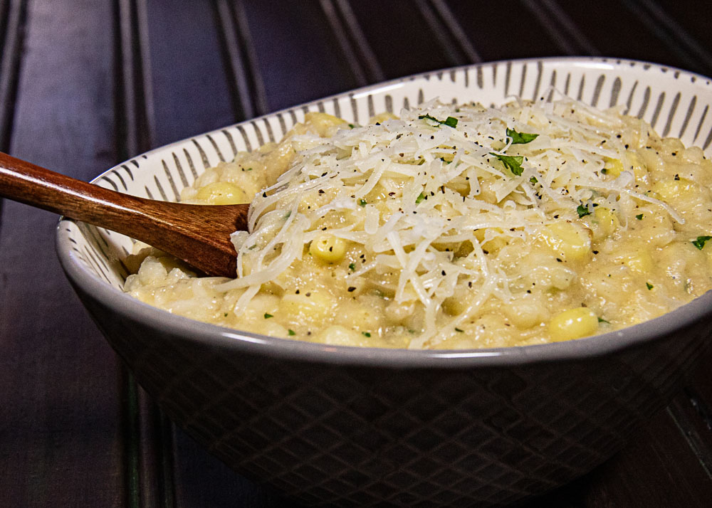 fresh corn risotto in bowl