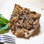 best ever carrot cake slice with mint sprig