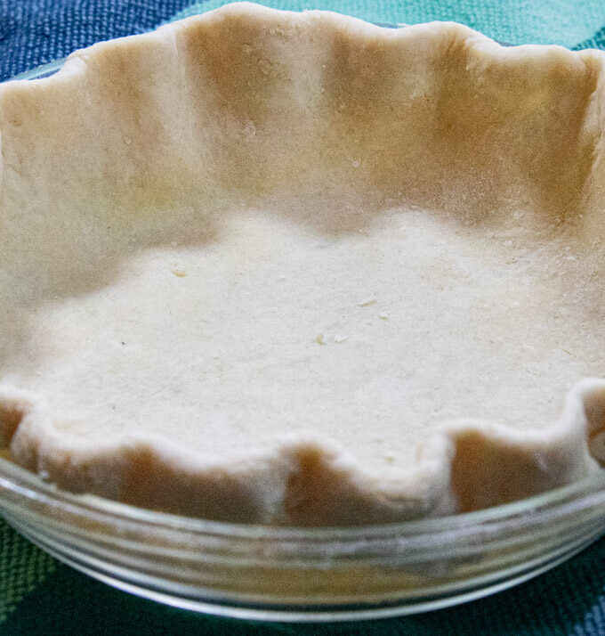 easy homemade pie crust unbaked in glass pie pan